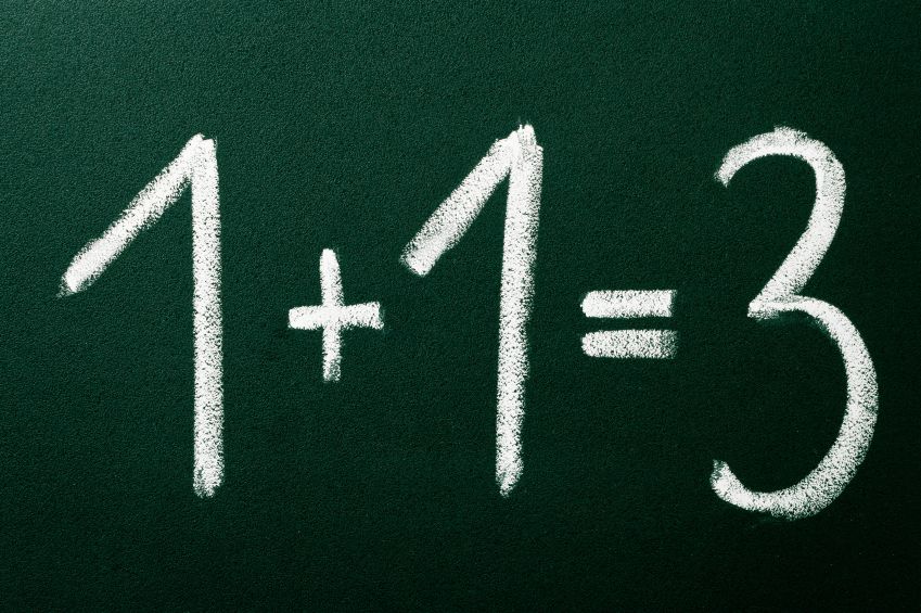 1+1=3 as mathematical calculations on green blackboard